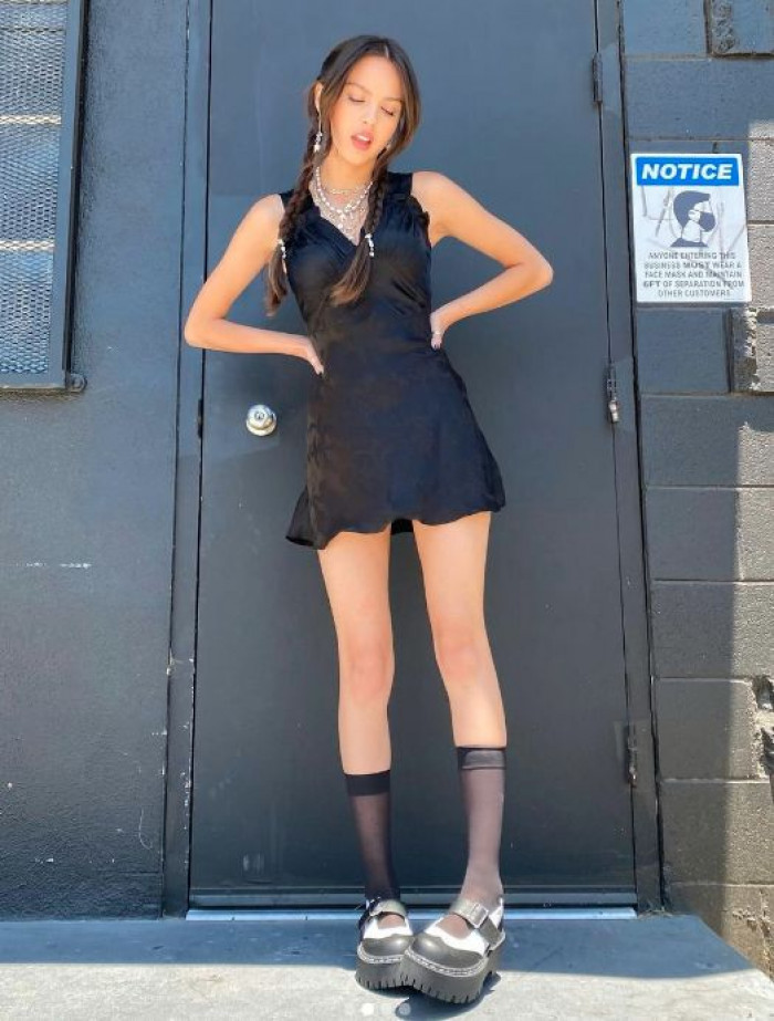 Olivia Rodrigo's Feet In High Black Boots